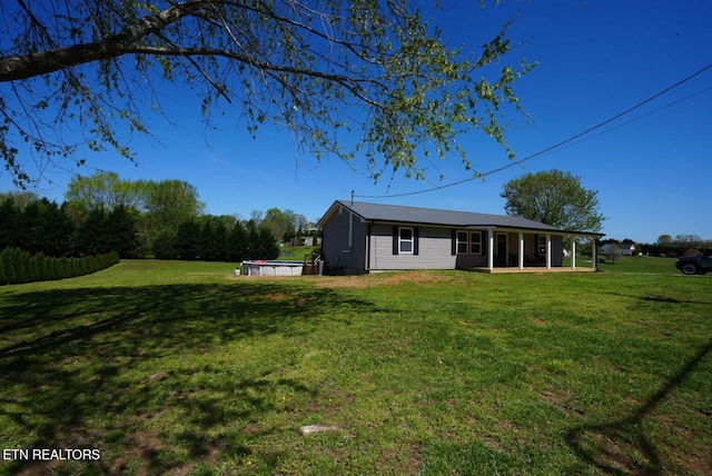 1712 Old Oak Grove Rd, Dandridge, TN 37725 - back of property with a lawn