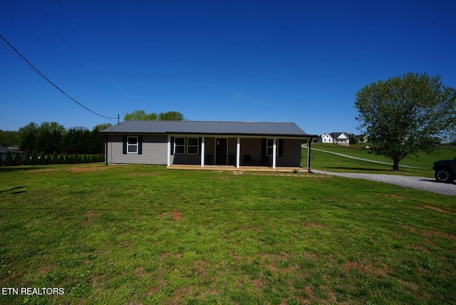 1712 Old Oak Grove Rd, Dandridge, TN 37725 - view of front facade featuring a front yard and metal roof