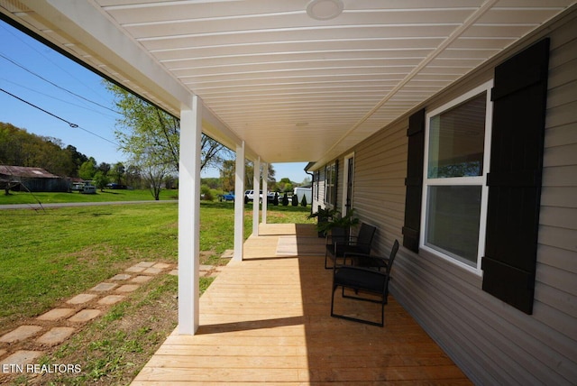 1712 Old Oak Grove Rd, Dandridge, TN 37725 - deck with covered porch and a yard
