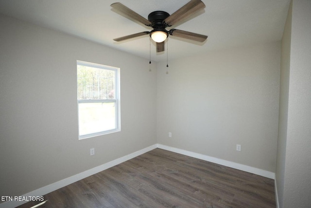 1712 Old Oak Grove Rd, Dandridge, TN 37725 - unfurnished room featuring ceiling fan, dark wood finished floors, and baseboards
