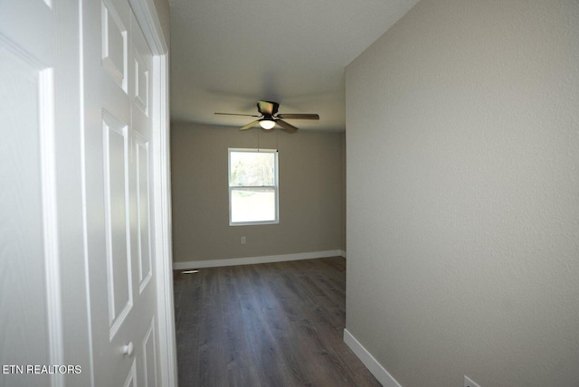 1712 Old Oak Grove Rd, Dandridge, TN 37725 - unfurnished room featuring ceiling fan, dark wood-style flooring, and baseboards