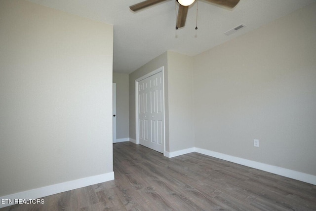 1712 Old Oak Grove Rd, Dandridge, TN 37725 - spare room featuring a ceiling fan, wood finished floors, and baseboards