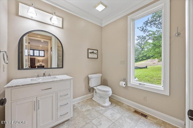 200 Bluffton Rd, Friendsville, TN 37737 - bathroom featuring baseboards, vanity, ornamental molding, and toilet