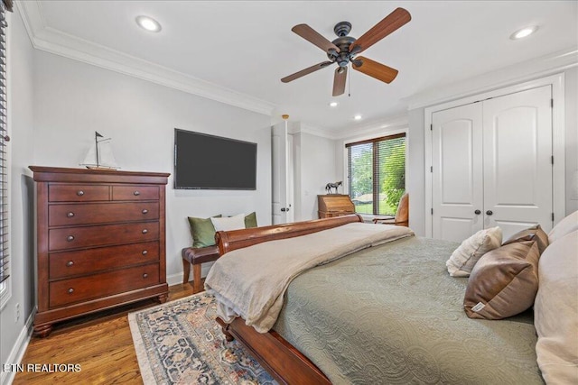 200 Bluffton Rd, Friendsville, TN 37737 - bedroom featuring wood finished floors, crown molding, baseboards, recessed lighting, and a closet