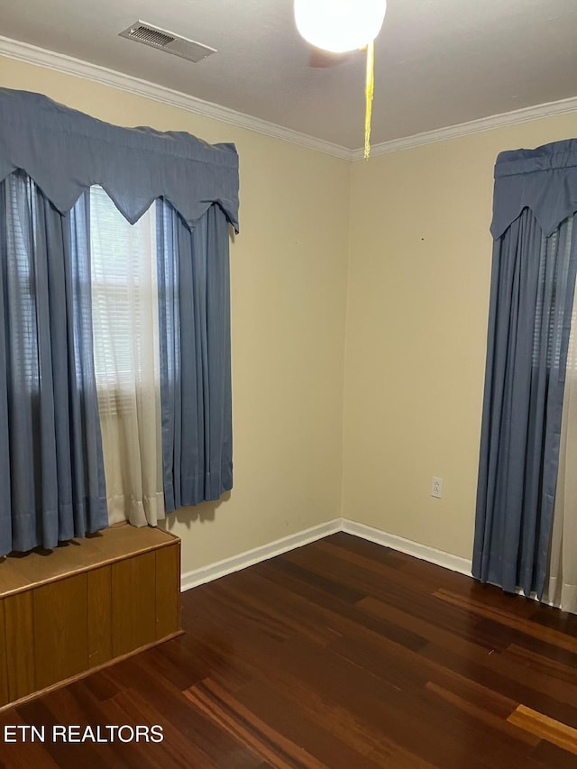 180 Cedar Ln, Jacksboro, TN 37757 - spare room featuring wood finished floors, crown molding, and baseboards