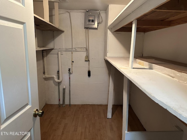 180 Cedar Ln, Jacksboro, TN 37757 - unfinished below grade area featuring light wood-type flooring and electric panel