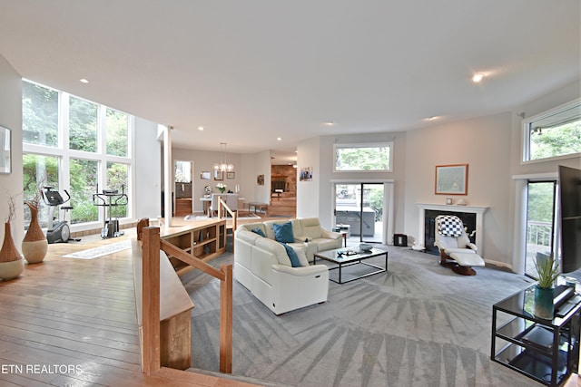12212 Oakmont Cir, Knoxville, TN 37934 - living area with recessed lighting, a chandelier, and a fireplace