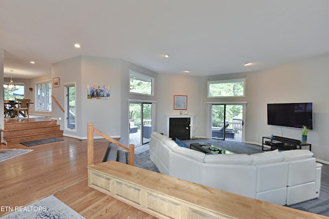 12212 Oakmont Cir, Knoxville, TN 37934 - living area with plenty of natural light, wood finished floors, recessed lighting, a chandelier, and baseboards