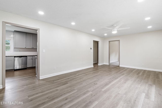 9505 Pearson Rd, Harrison, TN 37341 - unfurnished living room with light wood-style floors, ceiling fan, baseboards, and recessed lighting