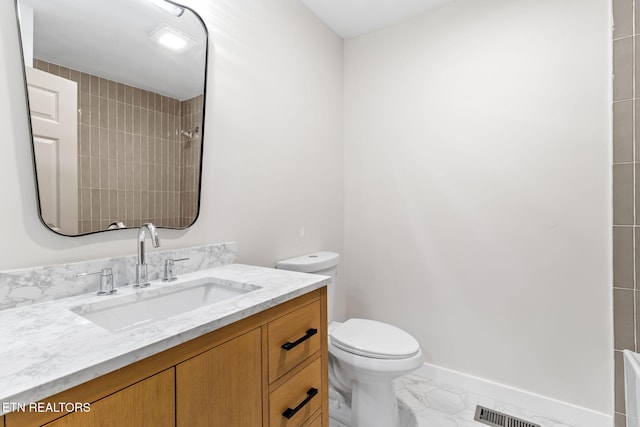 9505 Pearson Rd, Harrison, TN 37341 - bathroom with toilet, vanity, a shower, and marble finish floors