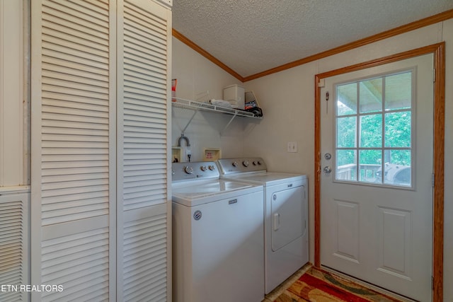 384 Lancer Rd, Harriman, TN 37748 - clothes washing area with crown molding, washing machine and clothes dryer, and a textured ceiling