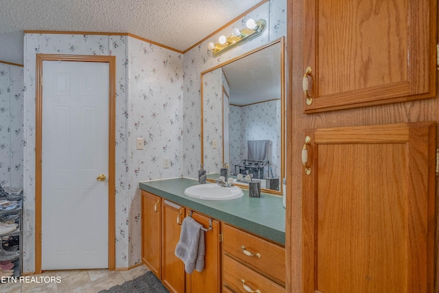 384 Lancer Rd, Harriman, TN 37748 - bathroom featuring wallpapered walls, a textured ceiling, crown molding, vanity, and tile patterned floors