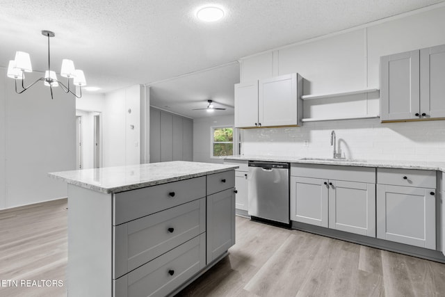 4817 Howardsville Rd, Apison, TN 37302 - kitchen with dishwasher, a sink, gray cabinets, light wood finished floors, and a textured ceiling