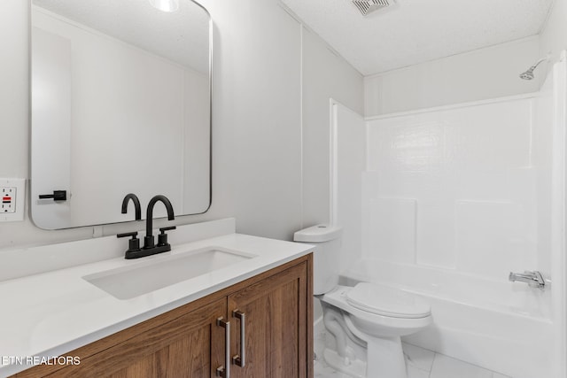 4817 Howardsville Rd, Apison, TN 37302 - full bathroom featuring marble look tiles, toilet, vanity, and shower / bathtub combination