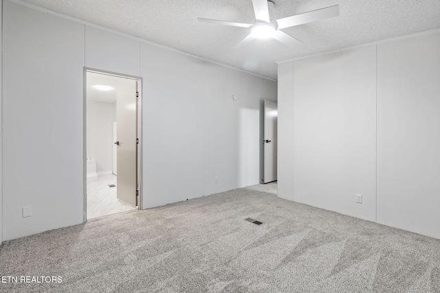 4817 Howardsville Rd, Apison, TN 37302 - unfurnished room featuring a ceiling fan, crown molding, carpet floors, and a textured ceiling