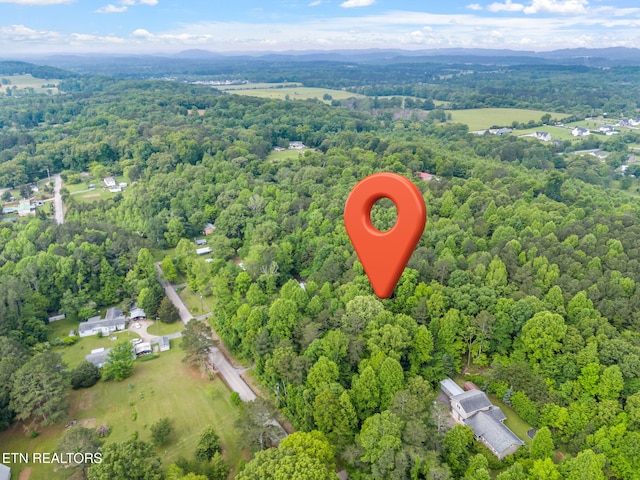4817 Howardsville Rd, Apison, TN 37302 - aerial overview of property's location with a heavily wooded area