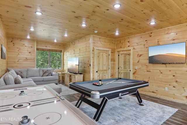recreation room with wooden ceiling, wooden walls, wood finished floors, and recessed lighting