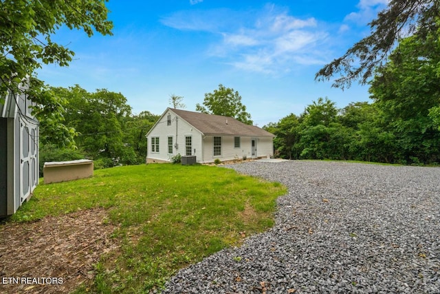 739 W Main St, Sevierville, TN 37862 - view of front of home with central air condition unit and a front yard