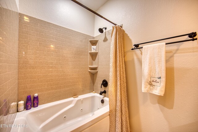 305 Griffin Ln, Allardt, TN 38504 - full bath featuring a textured wall and a combined bath / shower with jetted tub