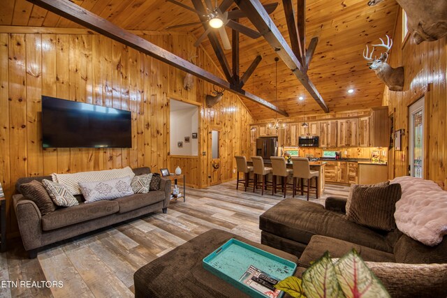 305 Griffin Ln, Allardt, TN 38504 - living area with wooden walls, light wood-style flooring, wooden ceiling, and ceiling fan