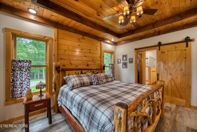 305 Griffin Ln, Allardt, TN 38504 - bedroom featuring wooden ceiling with exposed beams, hardwood / wood-style floors, multiple windows, and baseboards