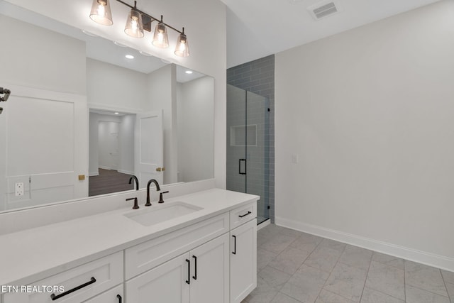 full bathroom featuring a shower stall, vanity, baseboards, marble finish floors, and recessed lighting