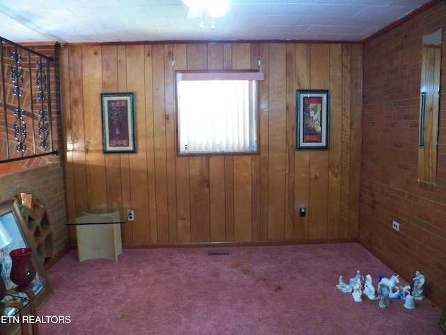 1634 Snodderly Dr, Lenoir City, TN 37771 - carpeted empty room featuring wood walls