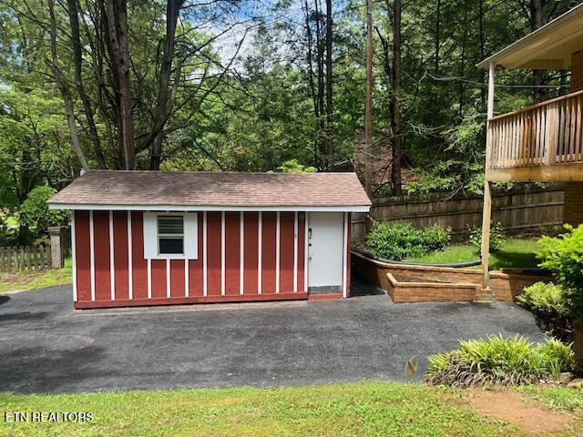 1634 Snodderly Dr, Lenoir City, TN 37771 - garage with fence and a shed