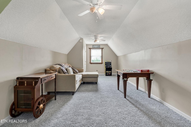 1023 NE Old Charleston Rd, Cleveland, TN 37312 - interior space with a textured ceiling, vaulted ceiling, carpet floors, a ceiling fan, and baseboards