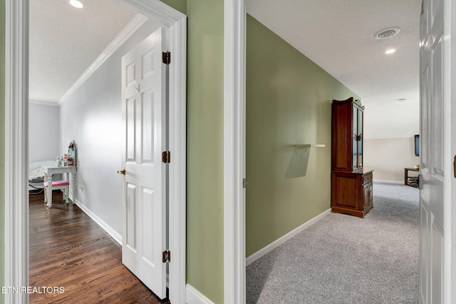 1023 NE Old Charleston Rd, Cleveland, TN 37312 - corridor with ornamental molding, a textured ceiling, baseboards, and recessed lighting