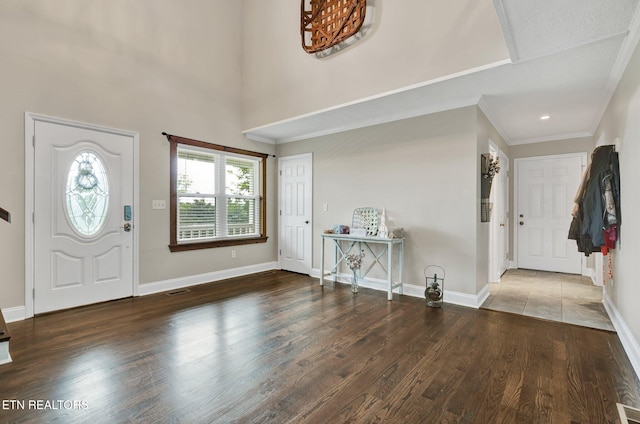 1023 NE Old Charleston Rd, Cleveland, TN 37312 - foyer entrance featuring wood finished floors, baseboards, and crown molding