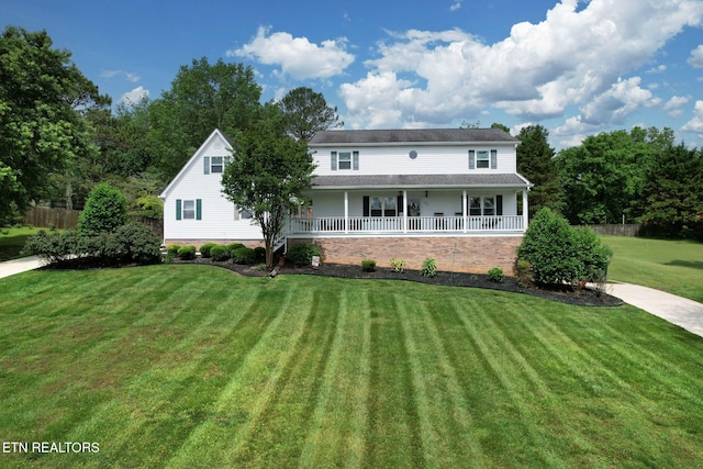 1023 NE Old Charleston Rd, Cleveland, TN 37312 - farmhouse-style home with covered porch