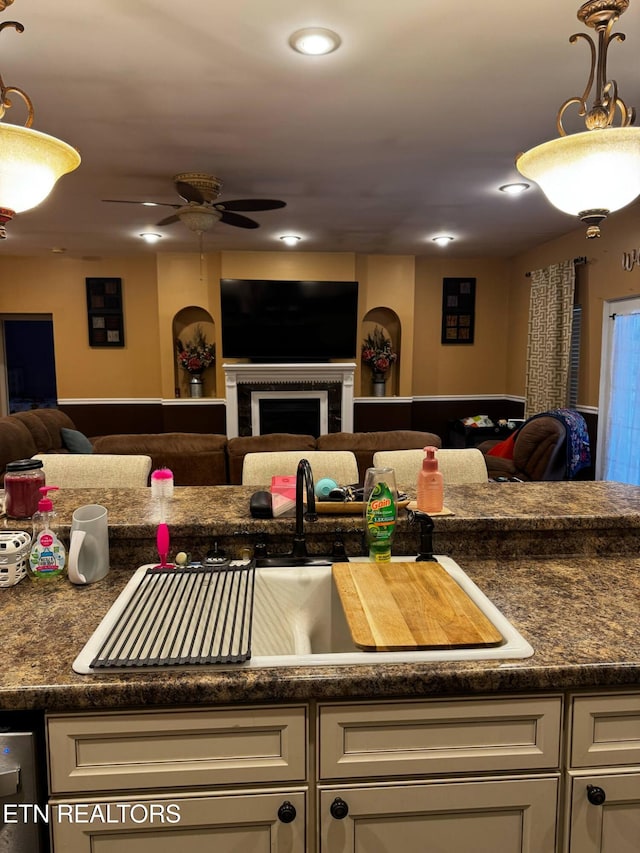 900 Twin Fawn Trl, Middlesboro, KY 40965 - kitchen with open floor plan, ceiling fan, dark countertops, white cabinetry, and recessed lighting