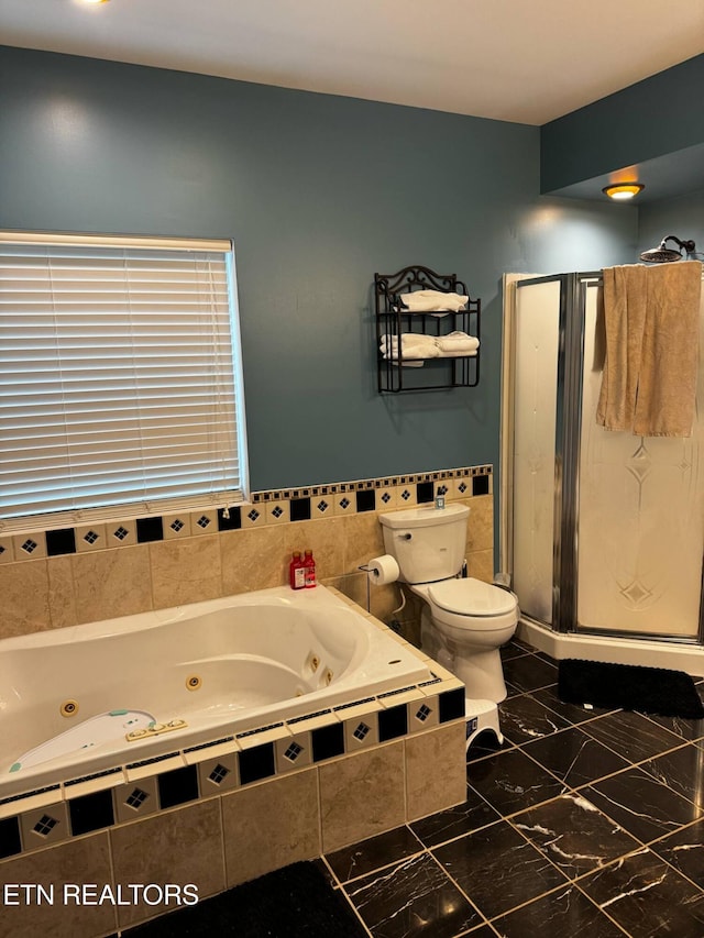 900 Twin Fawn Trl, Middlesboro, KY 40965 - full bathroom featuring a jetted tub, toilet, a stall shower, and marble finish flooring