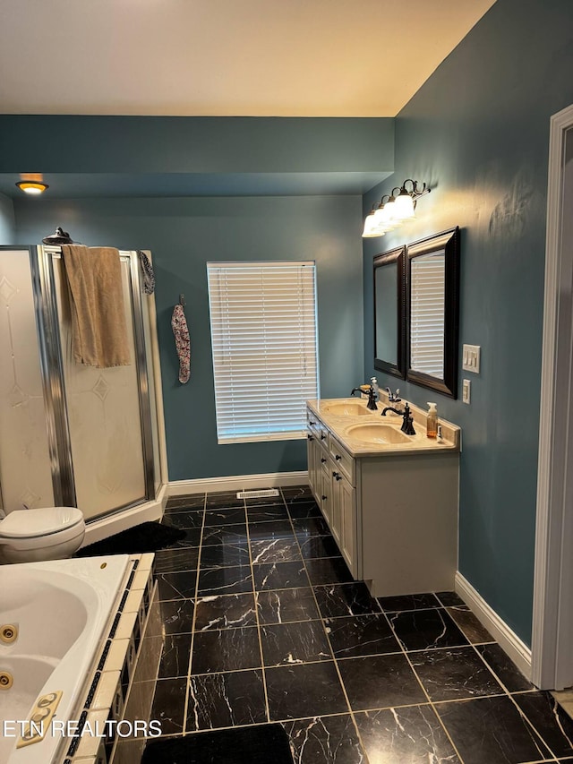 900 Twin Fawn Trl, Middlesboro, KY 40965 - full bath featuring baseboards, a tub with jets, double vanity, marble finish flooring, and a stall shower
