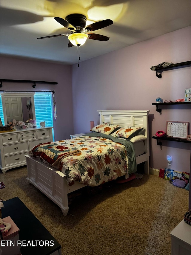 900 Twin Fawn Trl, Middlesboro, KY 40965 - bedroom featuring dark colored carpet and a ceiling fan