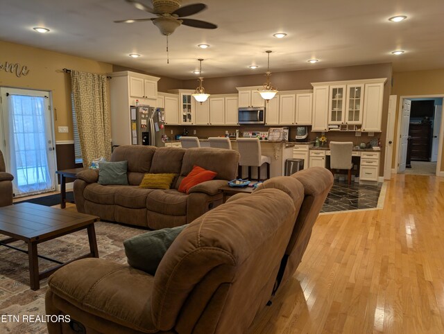 900 Twin Fawn Trl, Middlesboro, KY 40965 - living room featuring ceiling fan, light wood-type flooring, recessed lighting, and baseboards