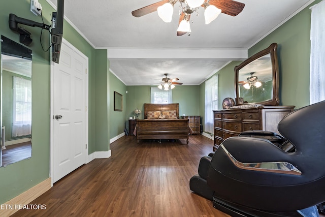 bedroom featuring ornamental molding, wood finished floors, baseboards, and ceiling fan