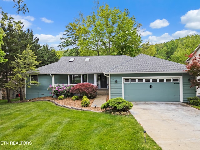 118 Motthaven Dr, Crossville, TN 38558 - ranch-style house featuring roof with shingles, a garage, a front yard, and driveway