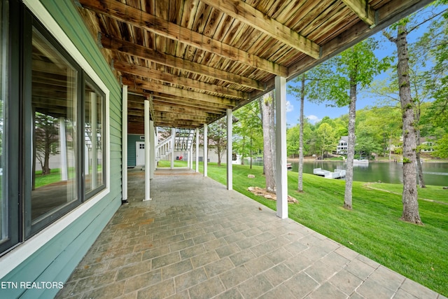 118 Motthaven Dr, Crossville, TN 38558 - view of patio featuring a water view, stairway, and view of wooded area