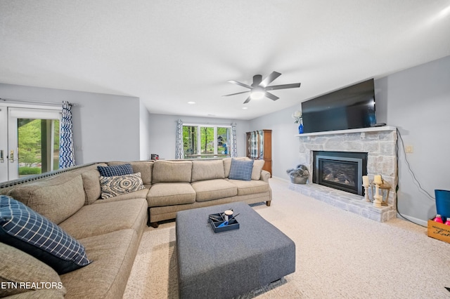 118 Motthaven Dr, Crossville, TN 38558 - carpeted living area with ceiling fan and a fireplace