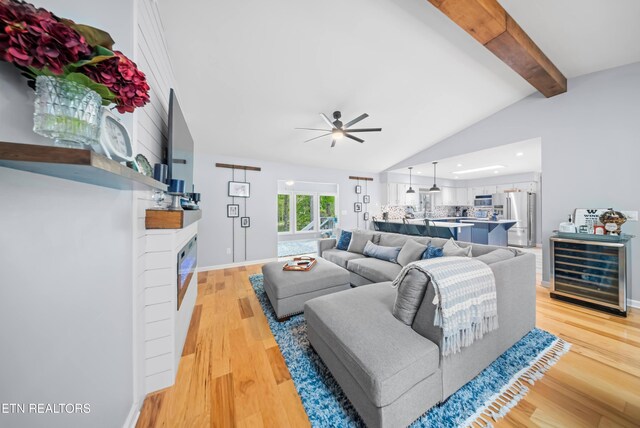 118 Motthaven Dr, Crossville, TN 38558 - living area featuring a ceiling fan, wine cooler, a glass covered fireplace, light wood finished floors, and recessed lighting