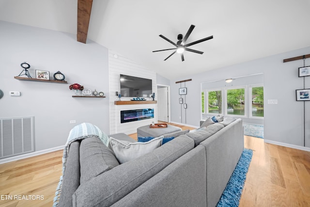 118 Motthaven Dr, Crossville, TN 38558 - living room featuring a fireplace, a ceiling fan, wood finished floors, and baseboards