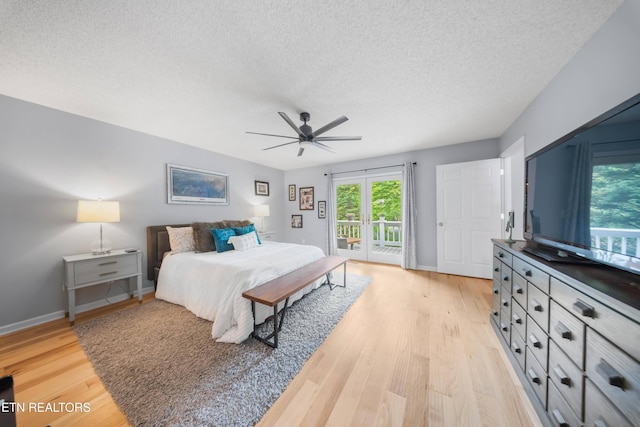 118 Motthaven Dr, Crossville, TN 38558 - bedroom featuring access to exterior, a textured ceiling, light wood-style floors, ceiling fan, and baseboards