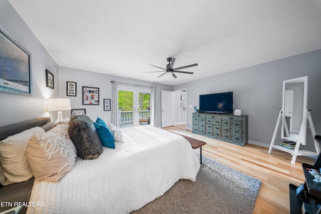 118 Motthaven Dr, Crossville, TN 38558 - bedroom with wood finished floors, access to exterior, a ceiling fan, a textured ceiling, and baseboards