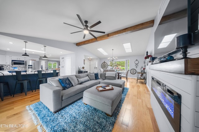 118 Motthaven Dr, Crossville, TN 38558 - living area with plenty of natural light, light wood-style flooring, ceiling fan, recessed lighting, and a chandelier