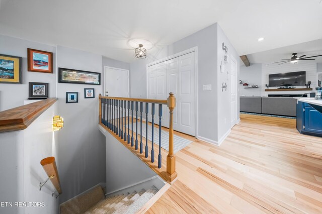 118 Motthaven Dr, Crossville, TN 38558 - stairs with wood finished floors, ceiling fan, baseboards, and recessed lighting
