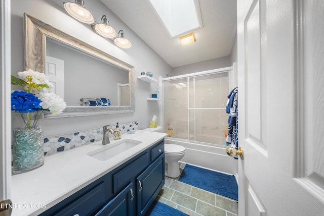 118 Motthaven Dr, Crossville, TN 38558 - bathroom featuring toilet, vanity, tile patterned flooring, and combined bath / shower with glass door
