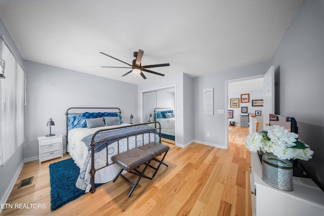 118 Motthaven Dr, Crossville, TN 38558 - bedroom featuring light wood-style flooring, a closet, and baseboards
