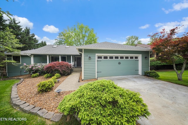 118 Motthaven Dr, Crossville, TN 38558 - ranch-style home featuring an attached garage, concrete driveway, and a shingled roof